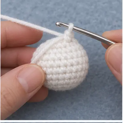Round lower white crochet snowman body