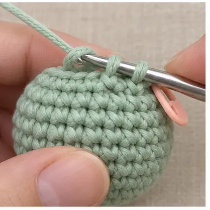 Two mint front loops gathered on one crochet hook