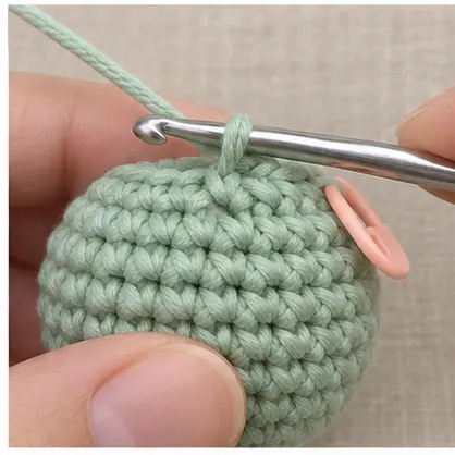 Two loops on hook before finishing a crochet invisible decrease