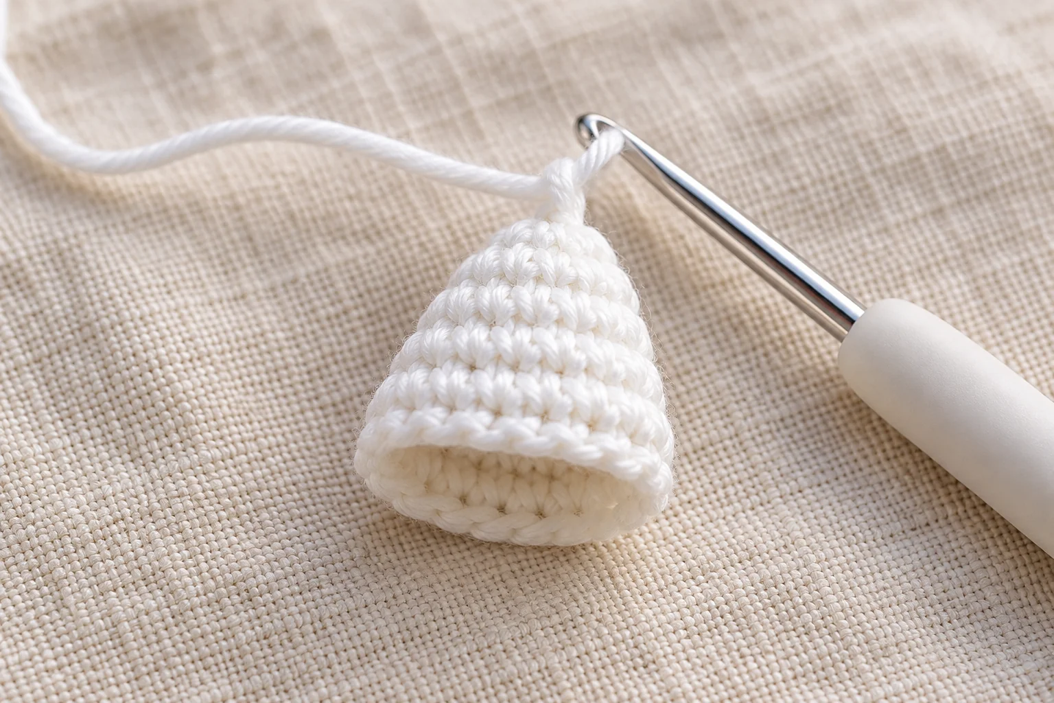 White crochet tip of the candy corn keychain